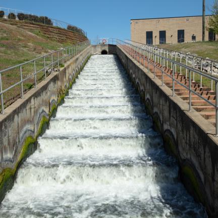 Photo: a cascade of water down a concrete staircase