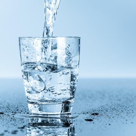 Photo: water filling up a glass