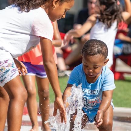 Photo: kids playing in a splash pad