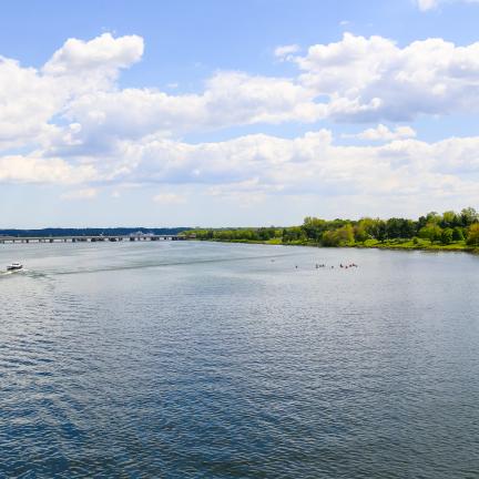 Photo: an image of the calm Potomac River on a bright day