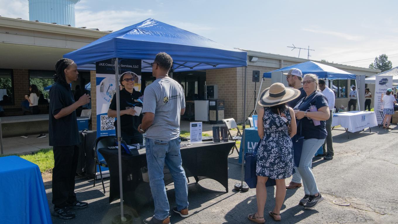 Vendors talk with Prince William Water employees at the 2026 Supplier Diversity Expo