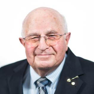 Professional portrait of Dr. K. Jack Kooyoomjian.