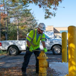 PWW crew member opening water hydrant