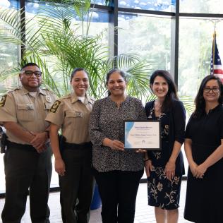 Prince William Water and Prince William County Government Staff pose with the Water Equity Network Certificate of Achievement.