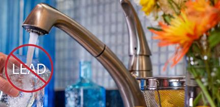 Graphic: a photo of someone filling up a glass from a tap. The word "lead" with a circle and slash through it are overlain on top of the photo.