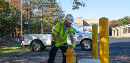 PWW crew member opening water hydrant