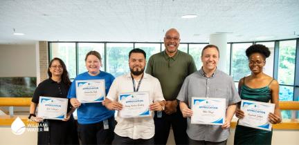 Prince William Water ambassadors posing with their certificates and General Manager Calvin Farr