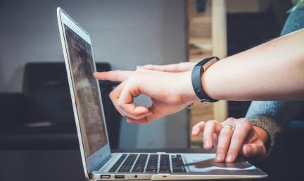 Stock Photo: Pointing at Computer
