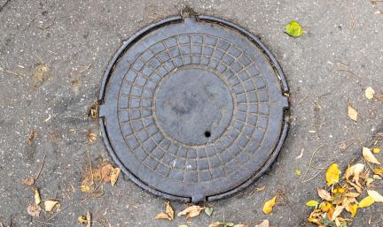 Photo: the top of a manhole lid