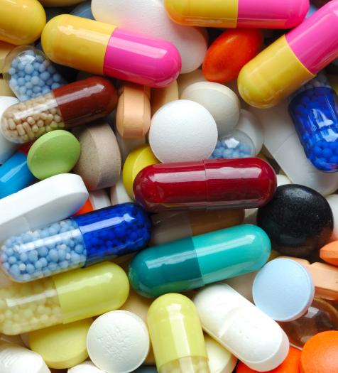 Photo: multicolored pills and capsules