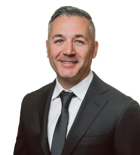 A professional headshot of Prince William Water Board of Directors Member Michael Garcia II